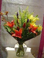 Iris, lillies, solidago, alstroemeria, and kangaroo