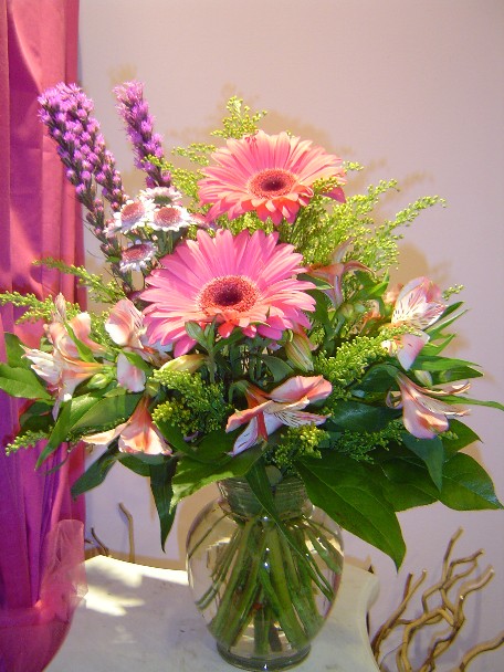 Gerbera, liatris, solidago, alstroemeria, and daisies