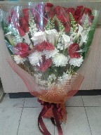 Roses (36), calla lillies (10), commercial mum (5), snapdragon (10), anthurium (5), dendrobium orchids (6), and greens