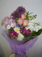 Alium, roses, stock, dalia, solidago, and alstroemeria