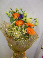 Roses, iris, lisianthus, gerbera, alstroemeria, and statice