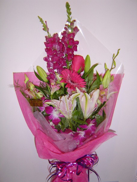 Snapdragon, gerbera, roses, lilies, dendrobium orchids, and alstroemeria