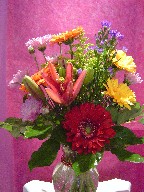 Gerbera, casino blue, solidago, mum, and lillies