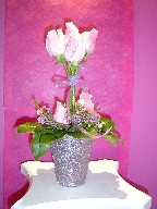 Pink roses and waxflowers