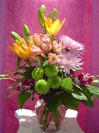 Spider mum, lillies, pompoms, orchids, and alstroemeria