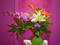 Lillies, solidago, gerbera, freesia, and orchids