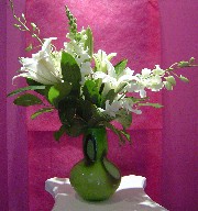 Casablanca, snapdragon, and orchids