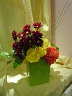 Commercial mum, roses, daisies, and steel grass