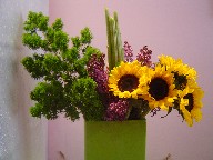 Sunflowers, lillac, and ming toy