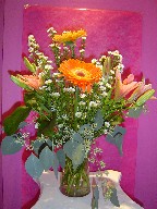 Gerbera, monte casino, lillies, and eucalyptus