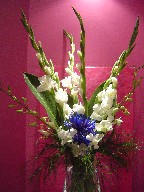 Gladiolas, spider mum, and orchids