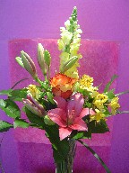 Snapdragon, rose, lillies, and alstroemeria