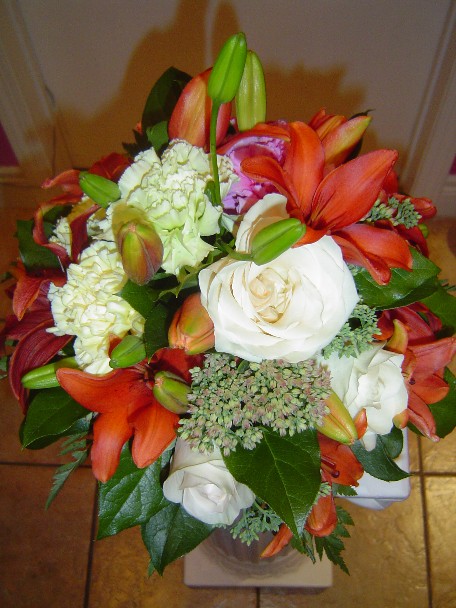 Sedum, lilies, roses, and carnations