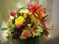 Shocking lilies, roses, tulips, daisies, carnations, and hypericum