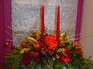 Coffee beans, gerbera, carnations, seed eucalyptus, Christmas ornaments, pine, pine cones, and lillies