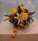 Alsmeer, gold roses, casablanca, tulips, and statice