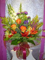 Aster, solidago, snapdragon, roses, alstroemeria, and heather