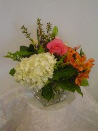 Hydreangea, roses, alstroemeria, lillies, and solidago