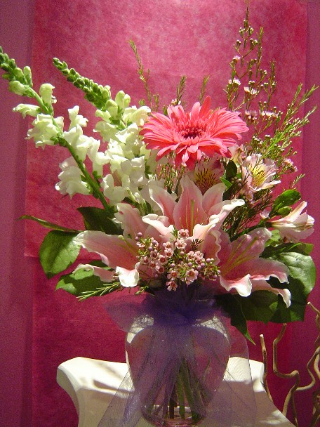 Snapdragon, lillies, gerbera, waxflowers, and alstroemeria