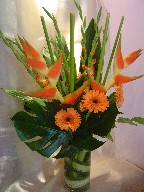 Heliconia, gerbera, gladiolas, and monstera