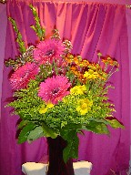 Gerbera, solidago, helenium, myrtle, and waxflowers
