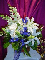 Roses, snapdragon, lillies, alstroemeria, and thryptomene