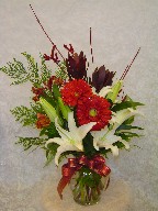 Gerbera, lillies, eucadendron, kangaroo, alstroemeria, cedar, and dogwood
