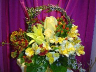 Roses, coffee beans, alstroemeria, helenium, thrytomene, and seed eucaplyptus
