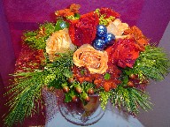 Berries, roses, daisies, solidago, and pine with Christmas decoration