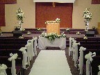 Aisle decorations and altar arrangements