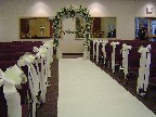 Wedding arch and aisle decorations