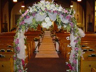 Wedding arch and aisle decorations