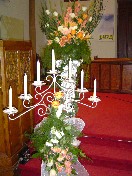 Candelabra decorations and altar arrangement