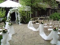 Aisle arrangements and wedding arch