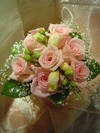 Roses, fresia, and baby's breath