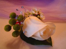 Rose, waxflowers, and green pompom