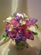 Roses, mini calla lillies, and fresia