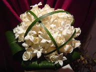 Roses, stephanotis, monkey grass, and aspedistra
