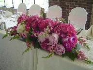 Hydreangea, peonies, orchids, roses, snapdragon, lillies, and monkey grass