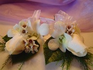 Orchid, rose, and waxflowers