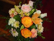 Roses, lillies, carnations, and daisies