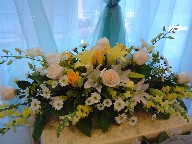 Roses, lillies, daisies, snapdragon, orchids, and solidago