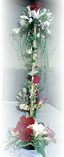 Roses, gerbera, calla lilies and bear grass