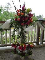 Alstroemeria, snapdragon, roses, lillies, carnations, and solidago