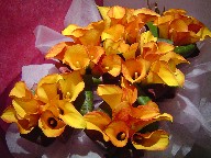 Mango calla lillies and cordeline