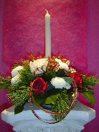 Ice cap, pine, pine cones, berries, and roses