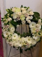 Roses, gerbera, spider mums, cymbidium orchids, variegated pitt, commercial mums, alstroemeria, and aspidestra